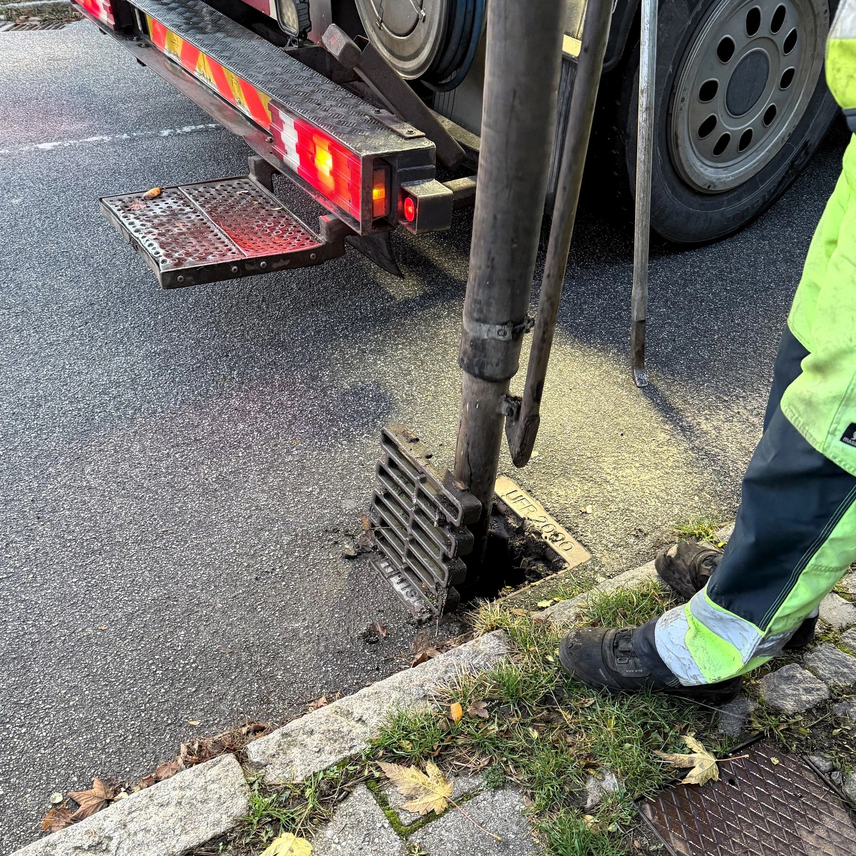 Utility worker near drainage infrastructure